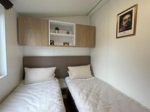 Postel nebo postele na pokoji v ubytování Holiday Home Tiny Haus Prinz Ludwig by Interhome