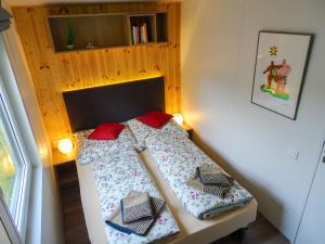 a small room with two beds in it at Holiday Home Neschtle by Interhome in Wemding