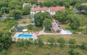 an aerial view of a house with a swimming pool at House Soul in Oklaj