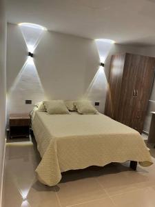 Postel nebo postele na pokoji v ubytování Apartaestudio 1 en Barranquilla