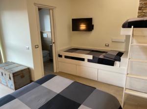 Łóżko lub łóżka w pokoju w obiekcie DOLCE VITA