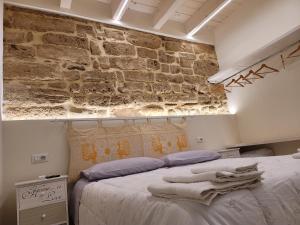 Postel nebo postele na pokoji v ubytování Paradiso di Maiorca