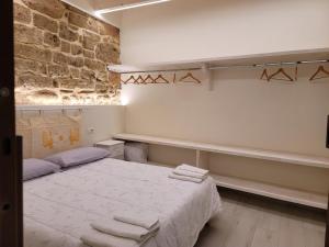 Postel nebo postele na pokoji v ubytování Paradiso di Maiorca