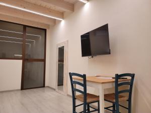 TV a/nebo společenská místnost v ubytování Paradiso di Maiorca