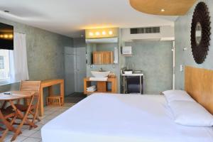 Kuchyň nebo kuchyňský kout v ubytování Hotel Rio Malecon