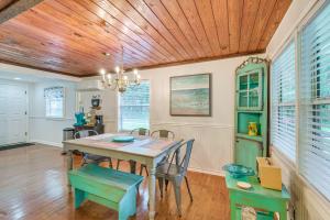 a dining room with a table and chairs at Quiet Retreat with Boat Parking, 2 Mi to Marina in Inglis