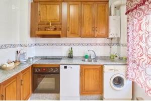 Η κουζίνα ή μικρή κουζίνα στο Un lugar con encanto +16 φωτογραφίες
