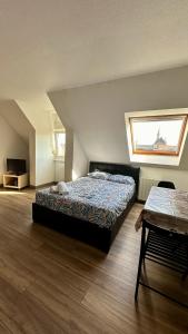 Кровать или кровати в номере Appartement 4 personnes en plein centre de Colmar