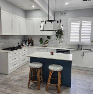 Dapur atau dapur kecil di Coastal Vibes 3 Bedrooms house