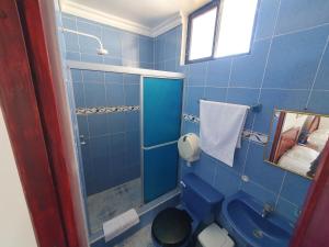 Vannituba majutusasutuses Hostal Insular