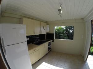 Køkken eller tekøkken på Gîte Pirates des Caraïbes