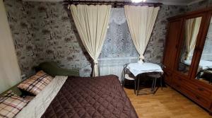 Postel nebo postele na pokoji v ubytování Коттеджный городок Вита -литовская, Голосеевский район, Динамо, Конча-Заспа