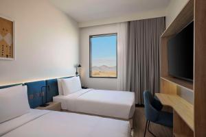 Hampton by Hilton Sharma NEOM Community 1客房内的一张或多张床位