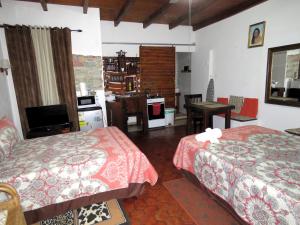 Rúm í herbergi á Artist Room Curaçao