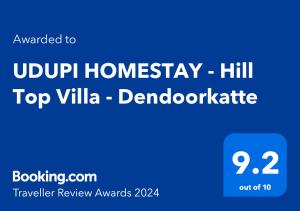 a blue sign with the words ugov homogeneity hill top villilla demod at UDUPI HOMESTAY - Hill Top Villa - Dendoorkatte in Udupi