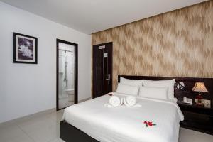 Postelja oz. postelje v sobi nastanitve Dylan Hotel Danang