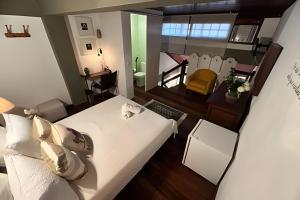 Cama ou camas em um quarto em Flat Âncora Confortável Duplex a Beira mar
