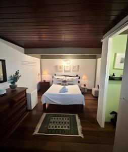 Cama ou camas em um quarto em Flat Âncora Confortável Duplex a Beira mar