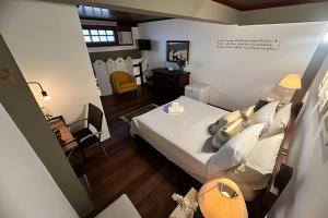 Cama ou camas em um quarto em Flat Âncora Confortável Duplex a Beira mar