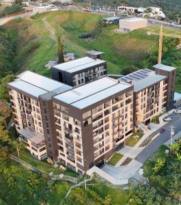 an overhead view of a large building with a lot at INTO suites, suite de lujo in Armenia