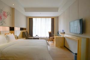 TV a/nebo společenská místnost v ubytování Paco Hotel Ouzhuang Metro Guangzhou-Free shuttle to Canton fair