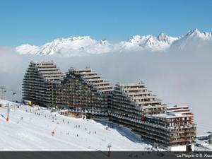 a large building on a ski slope with snow covered mountains at Studio Plagne Aime 2000, 1 pièce, 4 personnes - FR-1-181-2557 in Aime-La Plagne
