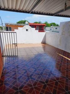 Ein Balkon oder eine Terrasse in der Unterkunft Cómodo Departamento a 2 cuadras de la playa
