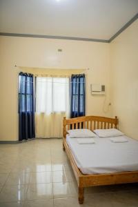 Postel nebo postele na pokoji v ubytování Fardesam - Budget Friendly Guest House