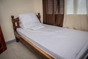 Postel nebo postele na pokoji v ubytování Fardesam - Budget Friendly Guest House