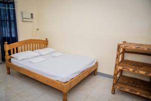 Postel nebo postele na pokoji v ubytování Fardesam - Budget Friendly Guest House