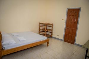 Postel nebo postele na pokoji v ubytování Fardesam - Budget Friendly Guest House
