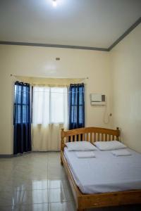 Postel nebo postele na pokoji v ubytování Fardesam - Budget Friendly Guest House