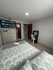 Postel nebo postele na pokoji v ubytování Acogedor apartaestudio con parking en Cartago