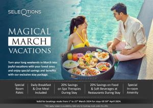 a man and woman sitting next to a pool with a basket of food at Ramgarh Lodge, Jaipur – IHCL SeleQtions in Jaipur