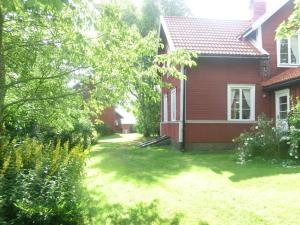 Photo de la galerie de l'établissement Karlstugan Cottage, à Vimmerby