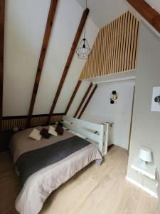 Llit o llits en una habitació de Gite Delphine