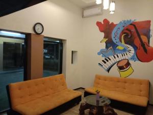 Afbeelding uit fotogalerij van Votel Nirmala Hotel Malang in Bareng