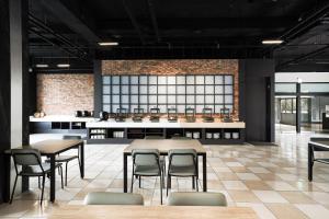 Restoran või mõni muu söögikoht majutusasutuses Hoya Hot Springs Resort, Guanziling