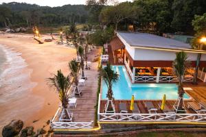 an aerial view of a resort with a swimming pool and the beach at One Beach Resort in Koh Rong Sanloem