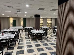 Reštaurácia alebo iné gastronomické zariadenie v ubytovaní Turia Valencia