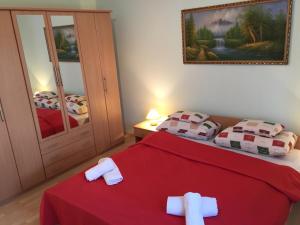 Posteľ alebo postele v izbe v ubytovaní Green Park Apartment