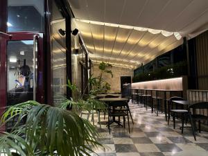 Reštaurácia alebo iné gastronomické zariadenie v ubytovaní Turia Valencia