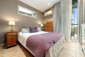 a bedroom with a bed and a window at Valle de los sueños in Canyelles +22 photos