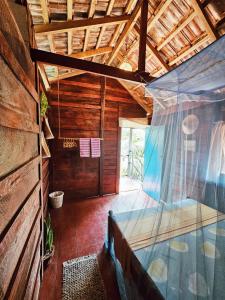 an inside view of a house with a glass ceiling at Bird House Mirissa in Mirissa