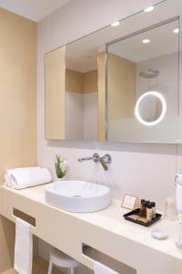 Un baño de Reginna Palace Hotel
