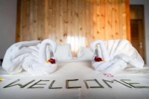Letto o letti in una camera di Sunbird Villas
