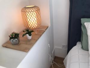Posteľ alebo postele v izbe v ubytovaní LE JARDIN D'ALEXANDRE