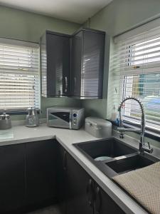 Kuchyň nebo kuchyňský kout v ubytování ELLIEMAYS + 29 fotografií