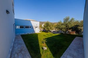 Zahrada ubytování Ferienhaus Elias Nikola