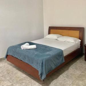 Een bed of bedden in een kamer bij Hotel Campestre Cafetal - Quindio - EJE CAFETERO